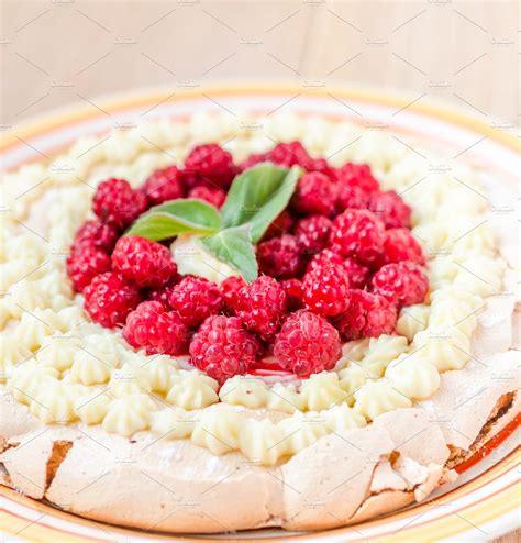 Beat the heavy cream with the powdered sugar and vanilla extract on high speed until. Pavlova meringue with raspberries | High-Quality Food ...