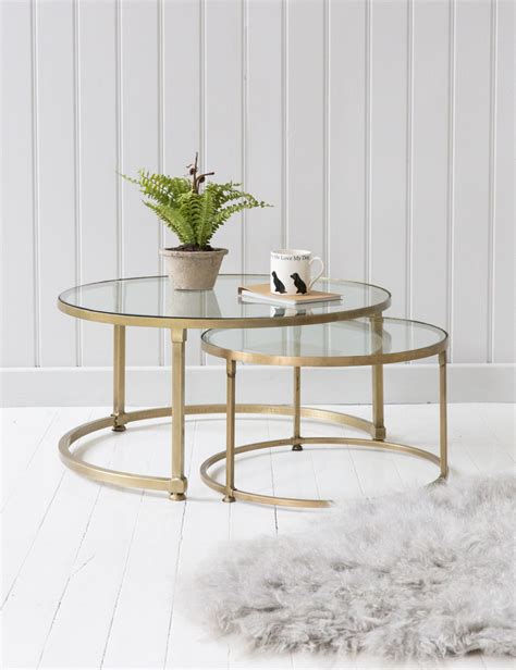Round glass coffee tables are very popular and demanded nowadays. Stacking Round Glass Coffee Table Set | Rose & Grey