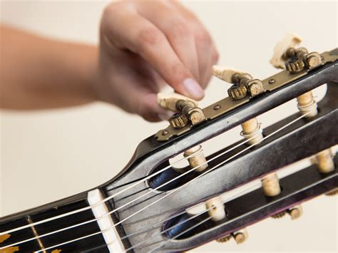 How To Change Strings On An Acoustic Guitar With Pictures