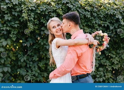 bride and groom at wedding day walking outdoors on spring nature bridal couple happy newlywed