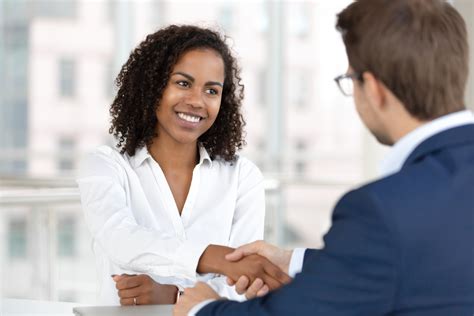 Smiling African American Hr Manager Handshake Hire Candidate At Job