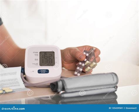 Blood Pressure Measurement With Sphygmomanometer And The Person With