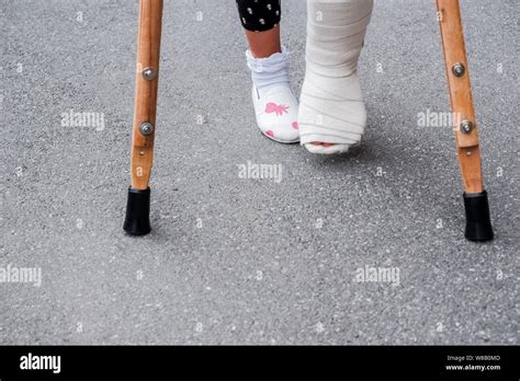 Chinese Girl Crutches With Sprain Ankle Pictures Telegraph