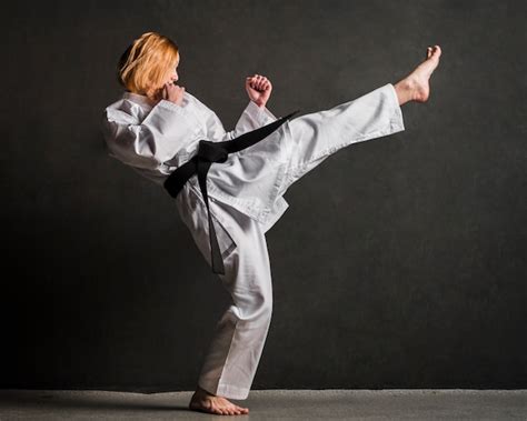 Free Photo Karate Woman Kicking Full Shot