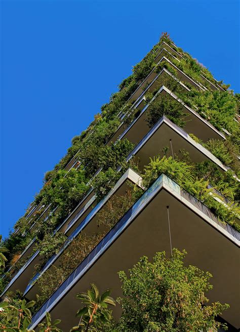 Download Green Building With Innovative Architectural Design Wallpaper