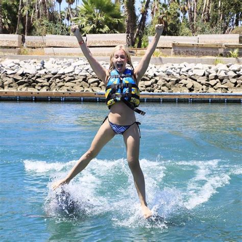 Kristine Leahy Riding On The Dolphins Hot Bikini Pics Bikini Pictures