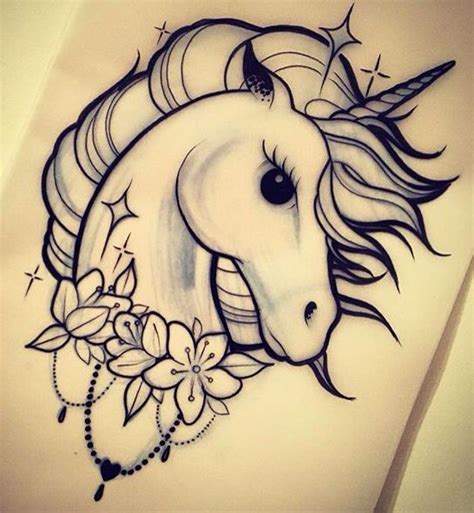 Flowers And Unicorn Head Tattoo Design