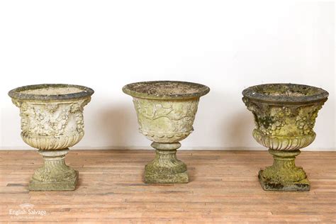 Pair Of Weathered Composition Stone Urns