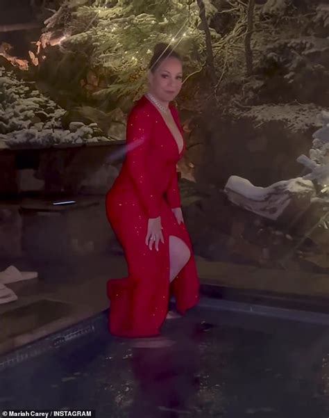 Mariah Carey Takes A Dip In Hot Tub Wearing Sparkling Gown And Full Glam During New Years Eve