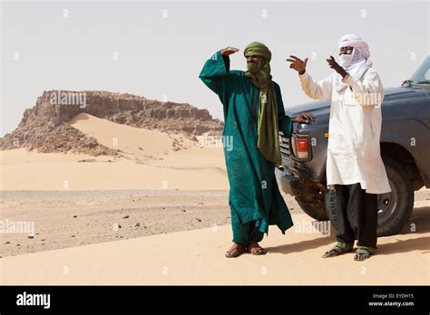 Niger Sahara Desert Escarpment Of Tiguidit Agadez Region Tuareg Men