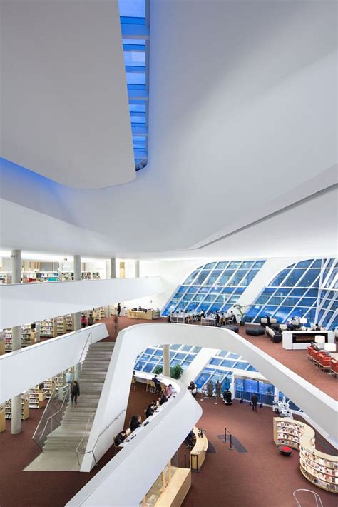 The Interior Of A Large Library With Many Bookshelves