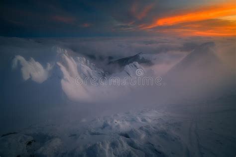 Dramatic Sunset Scene Landscape On Top Of The Mountains Looking Into
