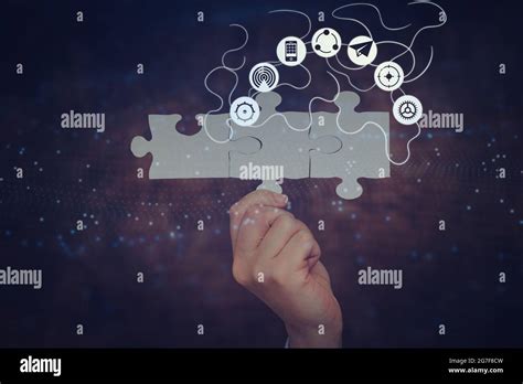 Hand Holding Jigsaw Puzzle Piece Unlocking New Futuristic Technologies