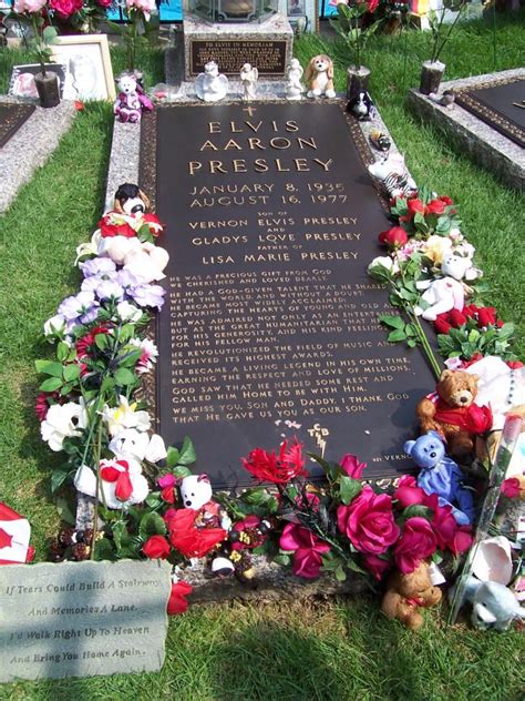 elvis sighting at graceland pool house the grave of the king note the tcb at the bottom of