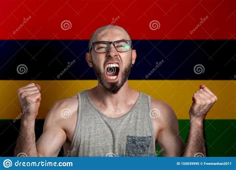 Emotions Of Anger And Indignation The Man In Glasses Clenched His
