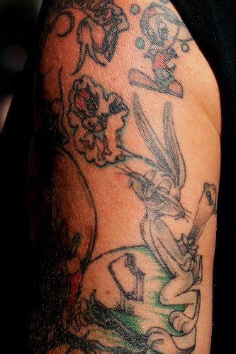 Future tattoos new tattoos tatoos wrist tattoos side stomach tattoos forearm tattoo quotes tattoos to cover scars lyric tattoos anchor tattoos. Tweety bird and bugs bunny on hand - Tattooimages.biz