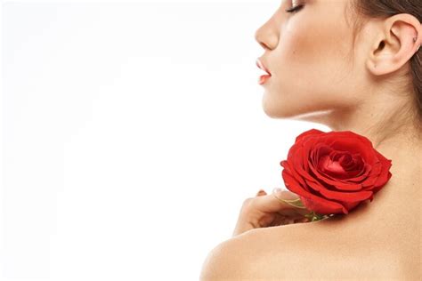 Premium Photo Portrait Of Woman With Red Rose Naked Shoulders