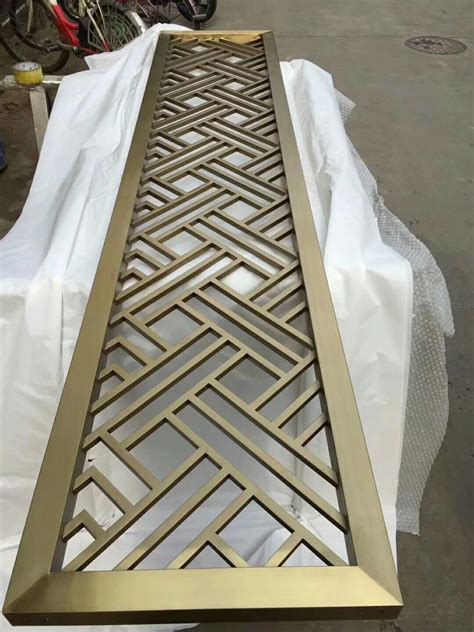 Metal Screen With Brass Finishing And Interlaced Design Metal Doors