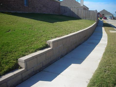 It can also be used to create curving walls, and unusually concrete blocks and cinder blocks can be used to create an interlocking or segmented wall that is either dry stacked or reinforced. DRC Retaining Walls & Fences - STONE GALLERY