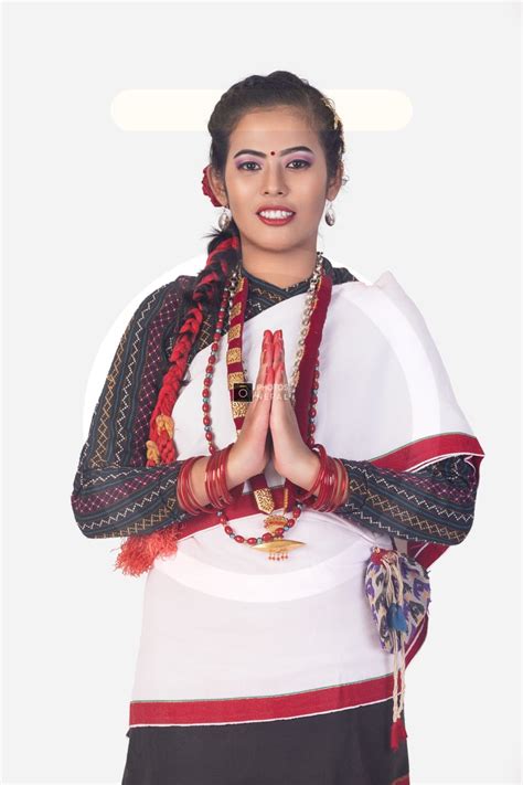 a newari woman in hakupatasi greeting with namaste photos nepal