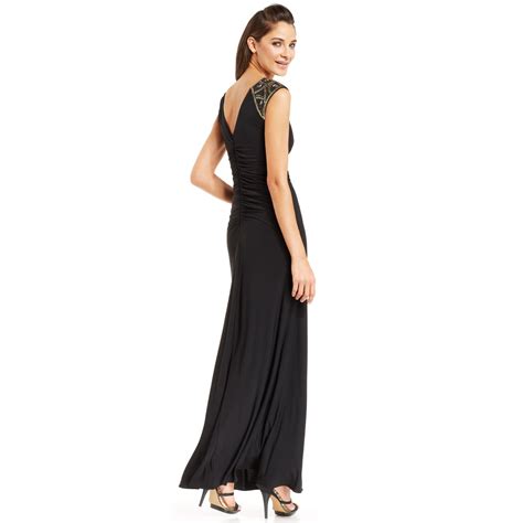 Xscape Cap Sleeve Beaded Ruched Gown In Black Lyst