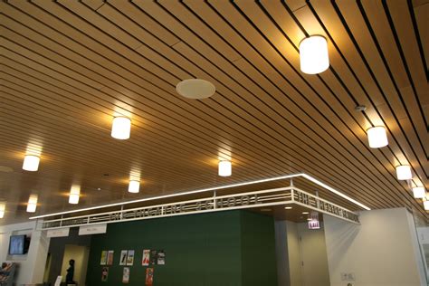 Wood ceiling planks are a versitile ceiling covering option. Wood Ceilings and Wall Panels | mauinc.com