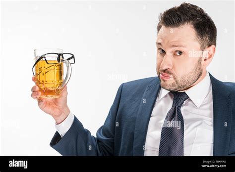 Chubby Man In Formal Wear Looking At Camera While Holding Glass Of Beer With Glasses On Isolated
