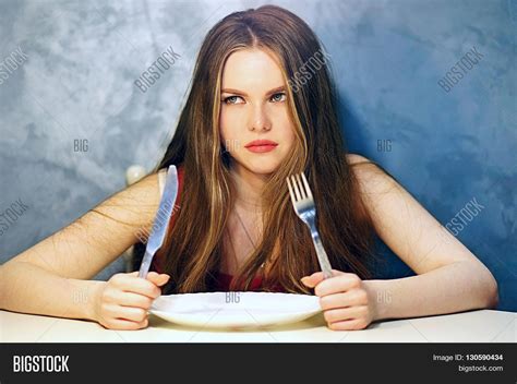 Hungry Young Woman Image And Photo Free Trial Bigstock