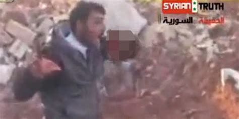 Sick Video Appears To Show Syrian Rebel Eating Dead Soldiers Heart