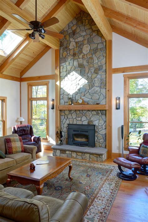 Awesome living room with fireplace and stunning top design. Family room with vaulted ceiling and stone fireplace. The ...