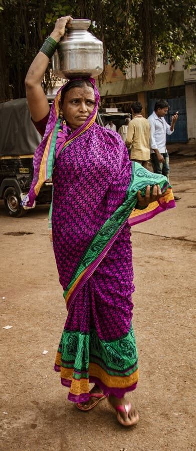 woman carries her load on her head editorial image image of country outdoor 155358630