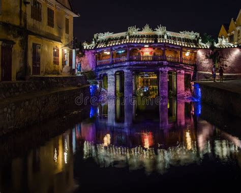 Night View Of Ancient Japanese Bridge With Lights In Hoi An Vietnam