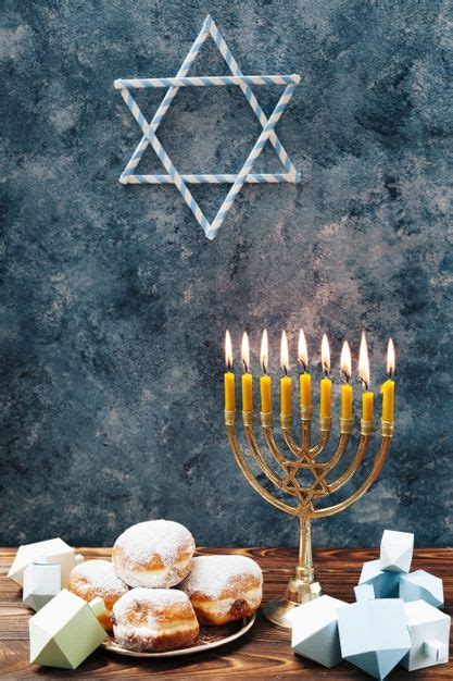 Download Jewish Sweets With Candleholder On A Table For Free Jewish