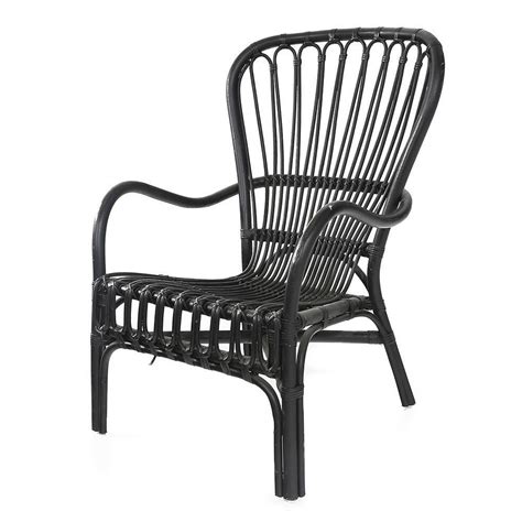 This lounge chair set is the focal point of any outdoor space with comfortable cushions, midcentury curves, and modern disposition. Black Wicker Outdoor Chair - Modernica Props