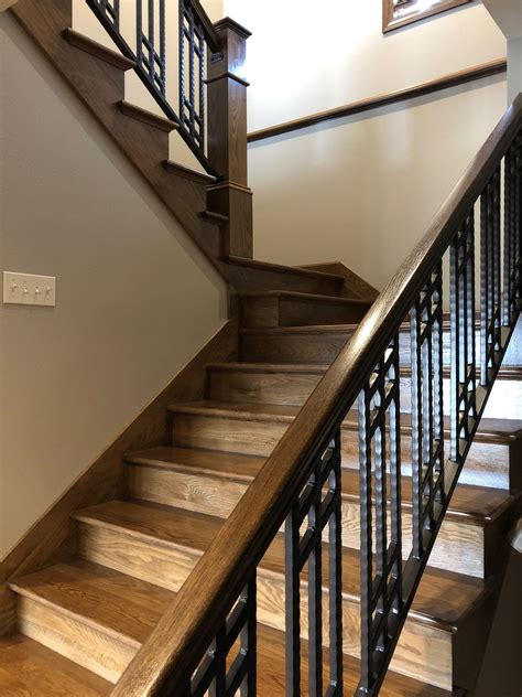 Red Oak Staircase With Metal Bars Complete Your Entry With Inviting