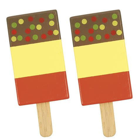Two Popsicles With Chocolate And Polka Dots On Them