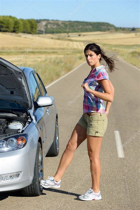 Woman Kicking Broken Engine Car Wheel Stock Photo Dirima