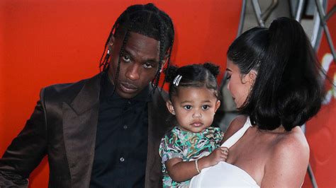 Stormi Webster Makes Cookies With Dad Travis Scott In A Red Dress