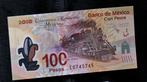 Billete de pesos El Heraldo de México