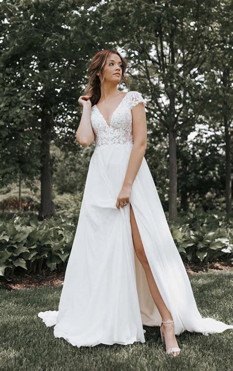 Lace Cap Sleeve Wedding Dress With Plunging V Neckline