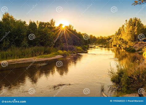 Small Forest River At Sunset In Autumn Beautiful Landscape Sunset On