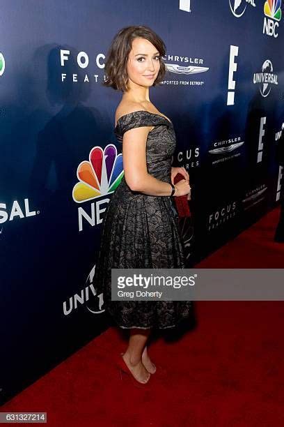 A Woman In A Black Dress Standing On A Red Carpet At The Nbc Upfront Event