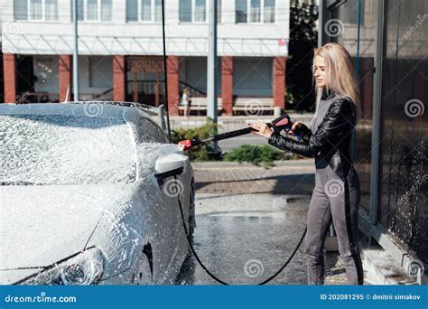 beautiful blonde woman washes her car at car wash stock image image of lather glamour 202081295
