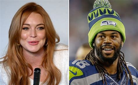 Seattle Seahawks Sidney Rice Retrieves Half Of Lindsay Lohans Fur
