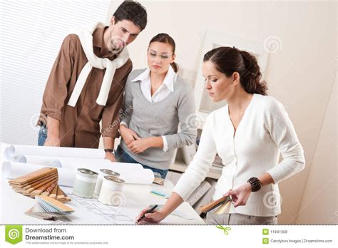 Female Interior Designer With Two Clients Stock Photo Image Of House