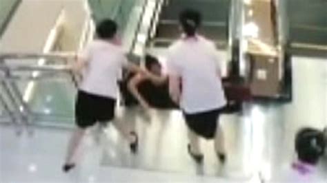 Chinese Woman Trapped In Escalator Dies But Saves Toddler Son Fox News