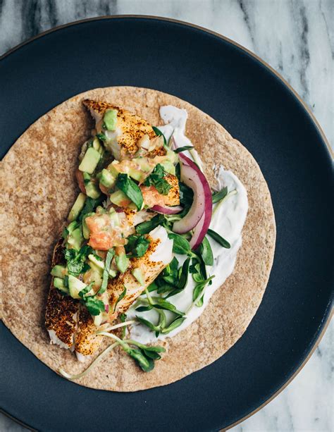 Garnish with diced tomato, corn, avocado, red onion, and mexican cheese. Broiled Tilapia Tacos with Avocado-Grapefruit Salsa