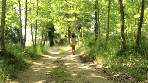 Young Attractive Woman Walking Relaxed On Nature Meditation Rural Sand Walk In National Park