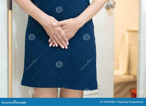 Hands Woman Holding Her Crotch Female Need To Pee Urinary Incontinence Stock Photo