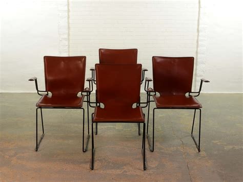 The parsons dining chair with button back has an attractive design which compliments most any home decor. Italian Red Leather and Enameled Black Steel Frame Dining ...